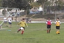 Brad punts the ball away after a save