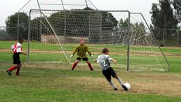Brad in goal about to make a stop