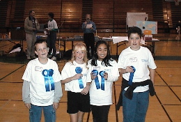 Brad (left) with his Geobowl team and two ribbons