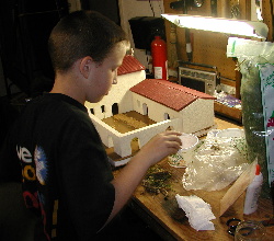 Brad applying final scenic touches