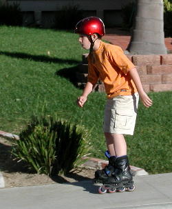 Brad "blading" around the neighborhood