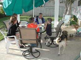 Dining on the patio with Art, Leslie and Yankee