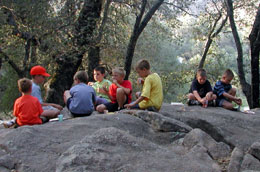 Brad holding court on the left while Doug and PJ plot insurrection