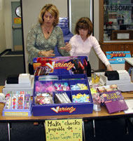 Gail and Kristi work the school Book Fair