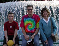 Brad, Keith and Kristi in front of fountain at Disney's California Adventure.